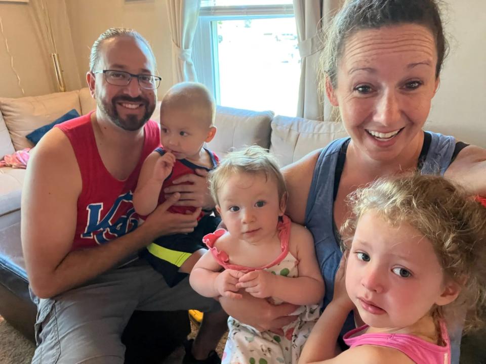 Eddie and Julie Flores with their children before moving to Lincoln, Kansas.