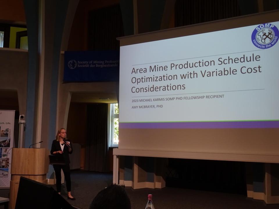 Amy McBrayer, a 2008 West Branch High School graduate, gives a presentation at the Society of Mining Professors Annual General Meeting in Clausthal-Zellerfeld, Germany, in September 2023. McBrayer is a mining engineer.