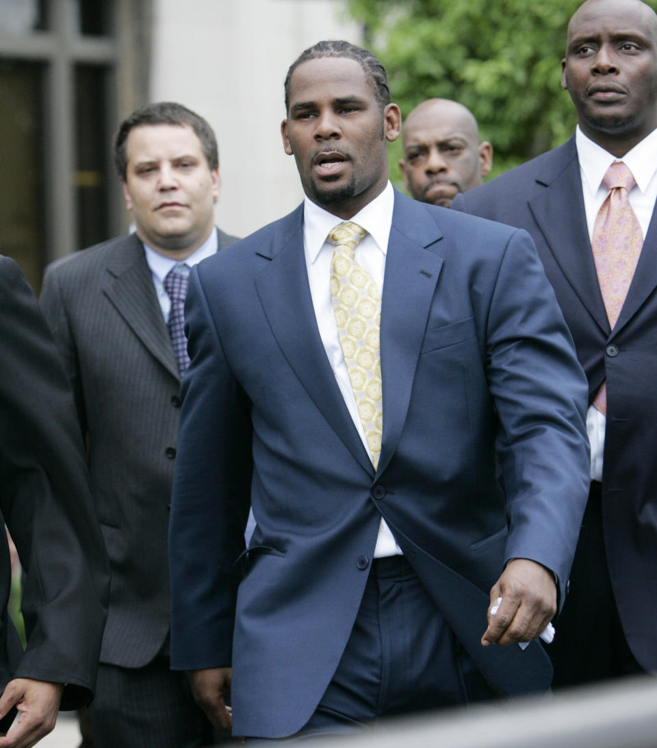 FILE - R&B singer R. Kelly leaves the Cook County Criminal Court Building on June 13, 2008, in Chicago. Kelly was acquitted on all counts after less than a full day of deliberations. The 54-year-old R&B singer will once again head to court this week. His federal trial in New York begins Wednesday, Aug. 18. 2021, and will explore years of sexual abuse allegations. He has vehemently denied the allegations against him. (AP Photo/Nam Y. Huh, File)