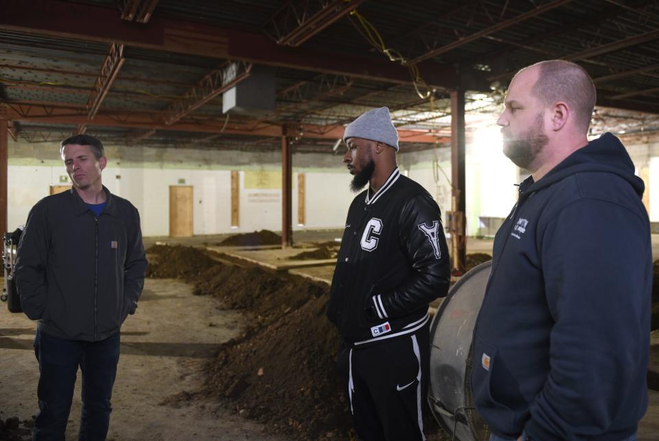 Canton For All People Executive Director Don Ackerman, Community Organizer Gino Hayes and Managing Director Michael Farmer talk about progress and plans as construction continues at the future Southeast Community Market and Health Center.