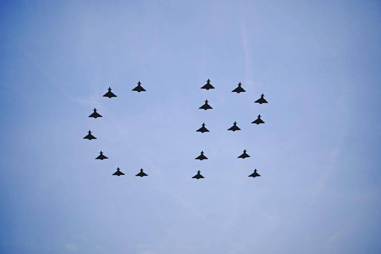 Typhoon fighter jets fly over The Mall (PA)