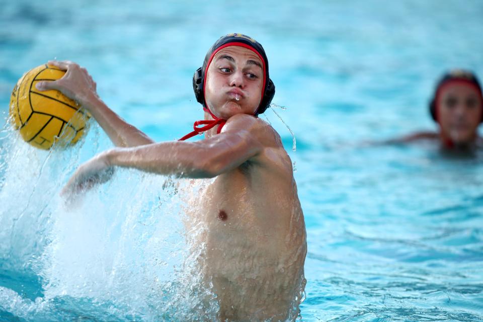 Jack Baker of Palm Desert High throws during the Desert Empire League water polo championships against Xavier Prep in Indio, Calif., on Wed., October 25, 2023.