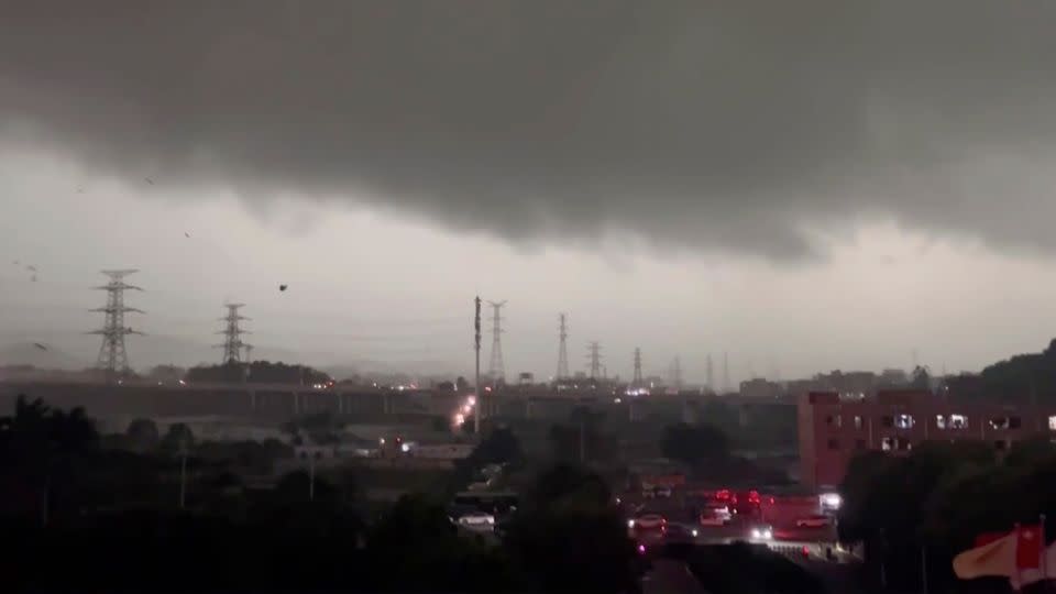 Storm clouds over the Baiyun district of the city of Guangzhou on April 27. - Li Jiayi/AP