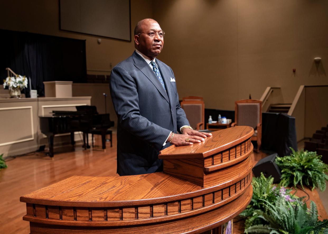 Rev. Keith Norman poses for a portrait inside the sanctuary at First Baptist Church- Broad on Tuesday, Aug. 31, 2021. New precautions will be set in place following a surge of new infections due to the delta variant.