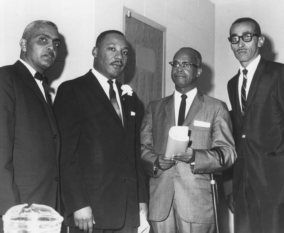 The Rev. Martin Luther King, Jr. poses with the Rev. Charles Rolette, the Rev. Bernard White and another unidentified local minister after speaking at the University of Notre Dame on Oct. 18, 1963.