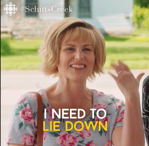 A woman saying she needs to lie down on "Schitt's Creek"