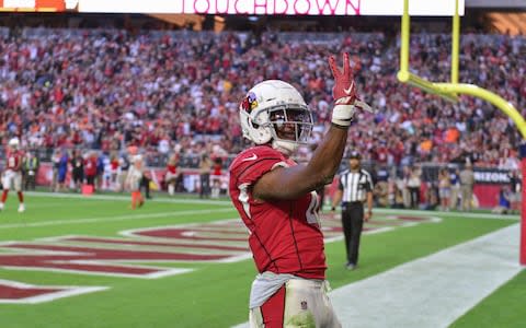 Arizona Cardinals running back Kenyan Drake (41) celebrates after scoring a touchdown during the second half against the Cleveland Browns at State Farm Stadium - Credit: USA Today