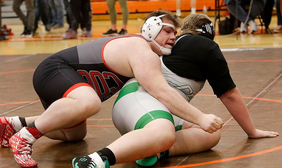 Crestview High School's Mitch Cline wrestles Clear Fork's Eric Hicks during the JC Gorman Invitational Saturday, Jan. 8, 2022 Mansfield Senior High School. TOM E. PUSKAR/TIMES-GAZETTE.COM