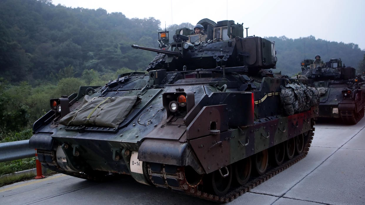  POCHEON, SOUTH KOREA - SEPTEMBER 19: U.S. soldiers on M2 Bradley armored vehicles take part during the Warrior Strike VIII exercise at the Rodriguez Range on September 19, 2017 in Pocheon, South Korea. The United States 2ID (2nd Infantry Division) stationed in South Korea operates the exercise to improve defense capability from any invasion. (Photo by Chung Sung-Jun/Getty Images). 