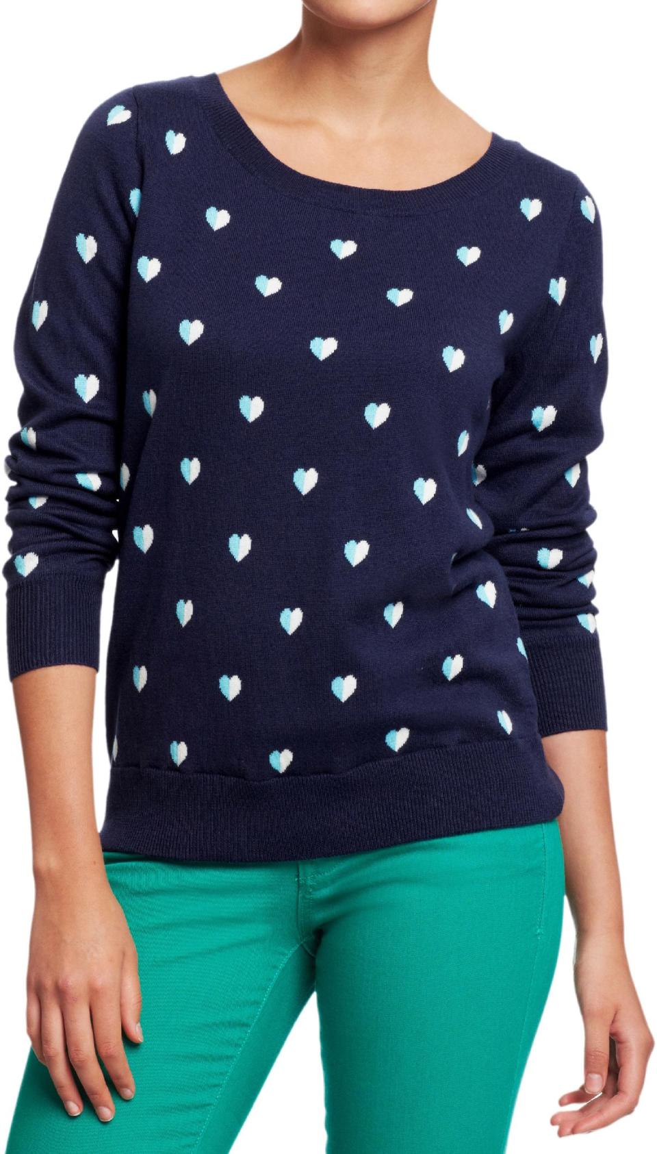 This undated publicity photo provided by Old Navy shows a crewneck sweater with a heart motif available at Old Navy. The good, the bad, the kitschy. A "seasonal sweater" is one way to start a conversation at a holiday function. (AP Photo/Old Navy)