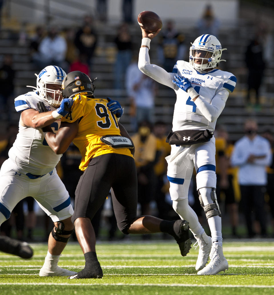 Georgia State quarterback Cornelious Brown IV throws in the first half during an NCAA football game, against Appalachian State Saturday, Nov. 14, 2020, in Boone, N.C. (Walt Unks/Winston-Salem Journal via AP)