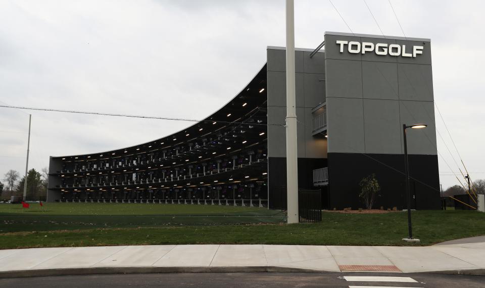 The new Topgolf sports entertainment complex features a high-tech golf game as well as several bars and food.