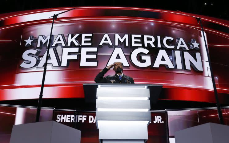 David Clarke salutes as he addresses the delegates during the opening day of the Republican National Convention in Cleveland. (Photo: Carolyn Kaster/AP)