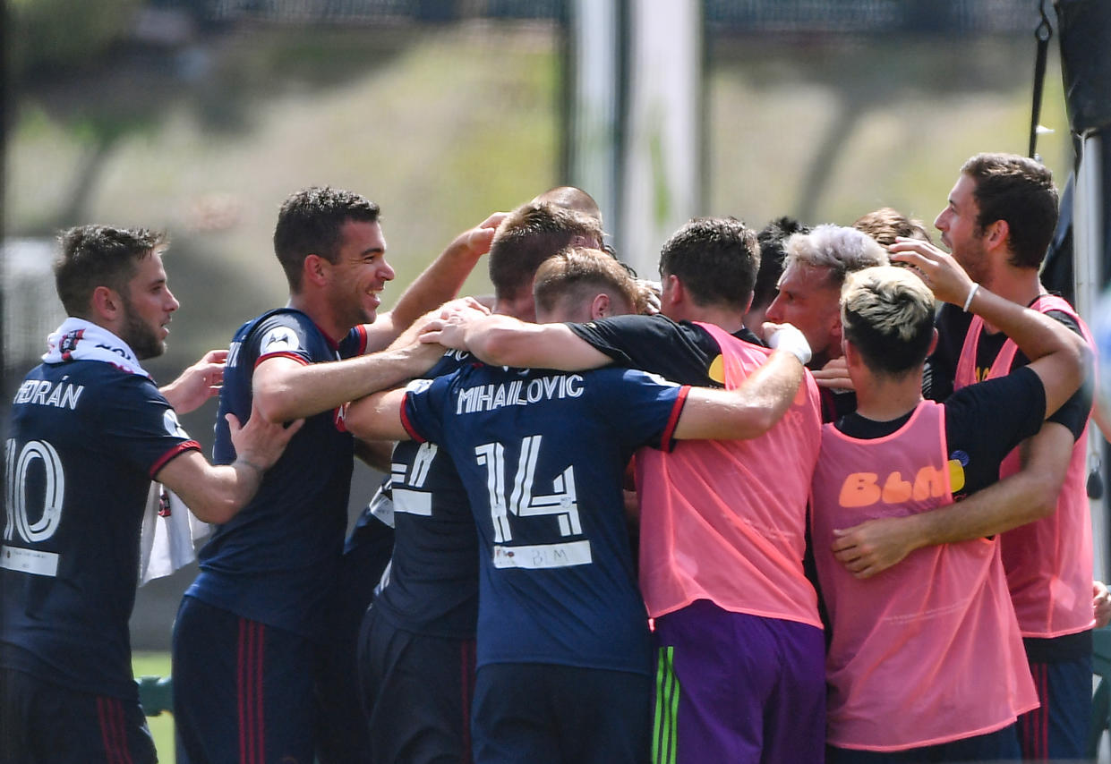 REUNION, FLORIDA - JULY 14: Chicago Fire celebrate a goal by Robert Beric #27 of Chicago Fire during a Group B match between Seattle Sounders FC and Chicago Fire FC as part of MLS is Back Tournament at ESPN Wide World of Sports Complex on July 14, 2020 in Reunion, Florida. (Photo by Mark Brown/Getty Images)