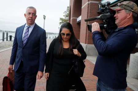 Klapper leaves the federal courthouse after being sentenced in Boston