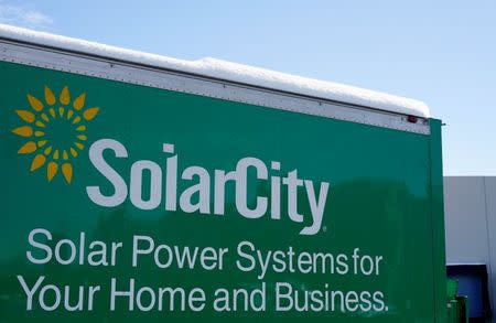 A sign is seen at the SolarCity building in Denver February 17, 2015. SolarCity reports earnings after the market closes February 18, 2015. REUTERS/Rick Wilking