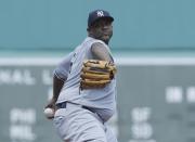 Jul 16, 2017; Boston, MA, USA; New York Yankees starting pitcher CC Sabathia (52) throws the ball against the Boston Red Sox in the first inning at Fenway Park. Mandatory Credit: David Butler II-USA TODAY Sports