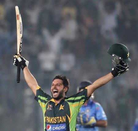 Pakistan's Shahid Afridi celebrates after Pakistan won the one-day international (ODI) cricket match against India at the 2014 Asia Cup in Dhaka March 2, 2014. REUTERS/Andrew Biraj