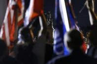 <p>Protesters gather before a monument of Jefferson Davis is removed in New Orleans on May 11, 2017. (Photo: Jonathan Bachman/Reuters) </p>