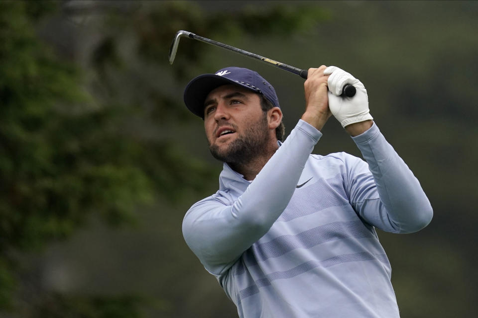 Scottie Scheffler watches his tee shot on the third hole during the final round of the PGA Championship golf tournament at TPC Harding Park Sunday, Aug. 9, 2020, in San Francisco. (AP Photo/Jeff Chiu)