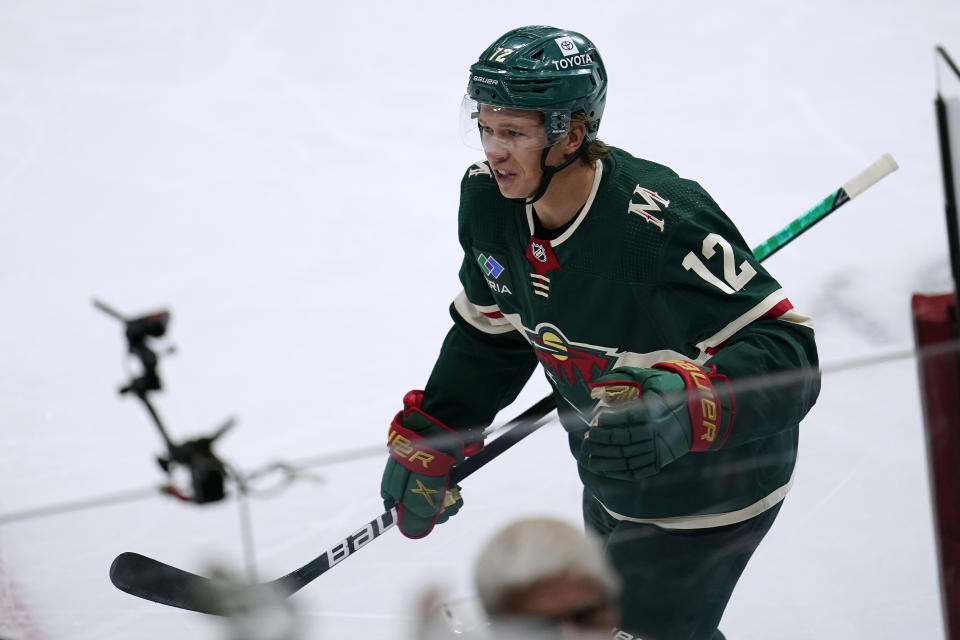 Minnesota Wild left wing Matt Boldy (12) celebrates after scoring a goal during the third period of the team's NHL hockey game against the New York Rangers, Thursday, Oct. 13, 2022, in St. Paul, Minn. (AP Photo/Abbie Parr)