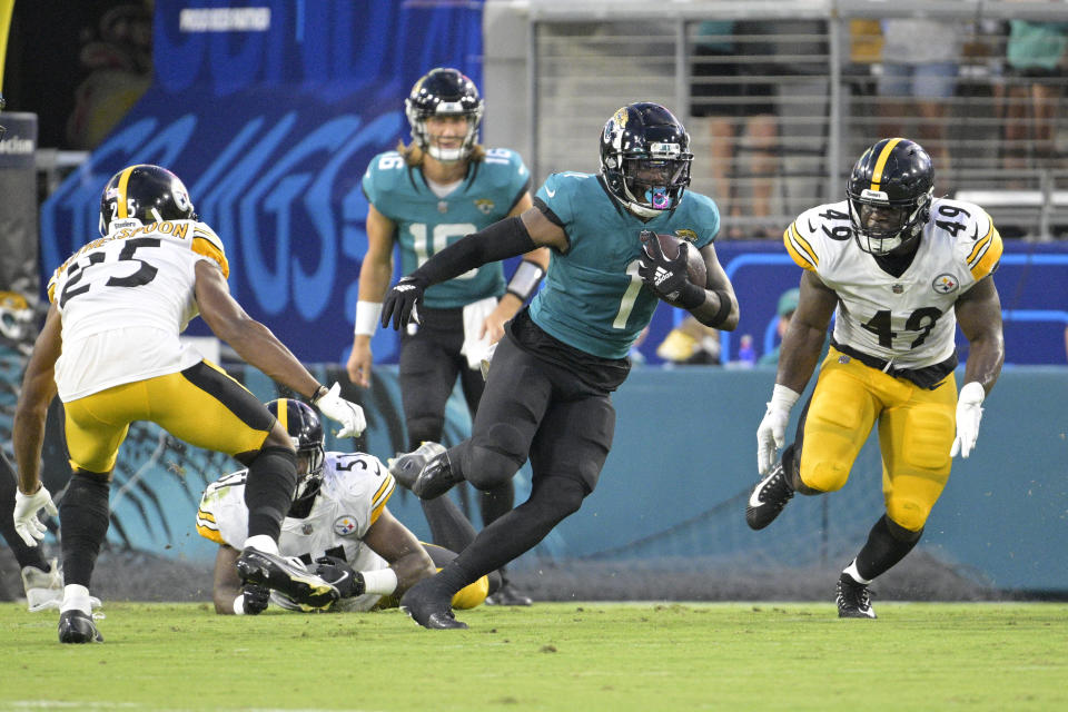 Jacksonville Jaguars running back Travis Etienne Jr. (1) is coming off a foot injury that cost him his entire rookie season. (AP Photo/Phelan M. Ebenhack)