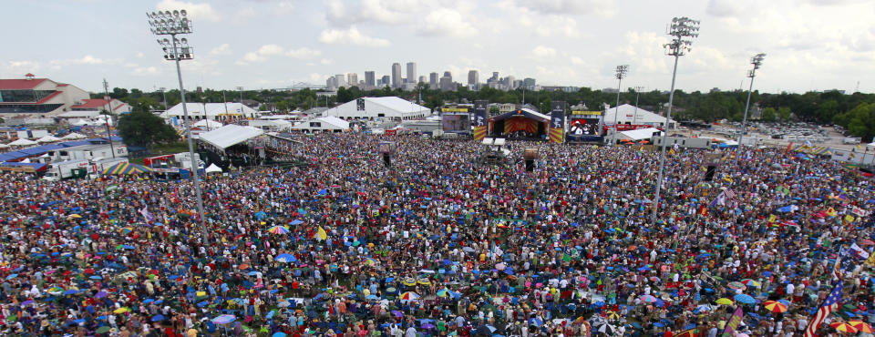 Crowds are seen at the New Orleans Jazz and Heritage Festival in New Orleans, Saturday, May 5, 2012. (AP Photo/Gerald Herbert)