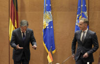 US Secretary of State, Antony Blinken, left, and German Foreign Minister Heiko Maas, right, arrive for a meeting at the Ramstein U.S. Air Base in Ramstein, Germany, Wednesday, Sept. 8, 2021. The largest American military community overseas houses thousands Afghan evacuees in a tent city at the airbase. (AP Photo/Michael Probst)