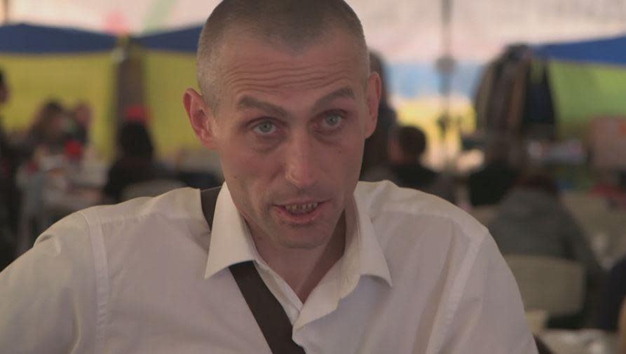 Fedor Zubkov, 36, speaks to CBS News at a shopping center in the Ukrainian city of Zaporizhia being used to shelter people fleeing front-line areas during Russia's invasion. Zubkov said a Russian strike killed his wife soon after Vladimir Putin ordered the invasion of Ukraine.   / Credit: CBS News