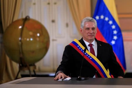 Cuba's President Miguel Diaz-Canel attends to a meeting with Venezuela's President Nicolas Maduro at the Miraflores Palace in Caracas, Venezuela May 30, 2018. REUTERS/Marco Bello