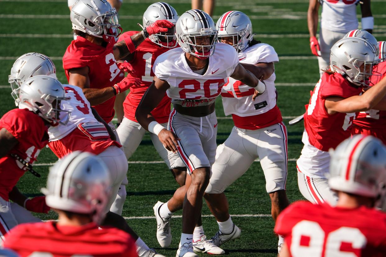 Aug 11, 2022; Columbus, OH, USA;  Ohio State Buckeyes safety Sonny Styles (20) rushes up the middle on a special teams drill during football camp at the Woody Hayes Athletic Center. Mandatory Credit: Adam Cairns-The Columbus Dispatch