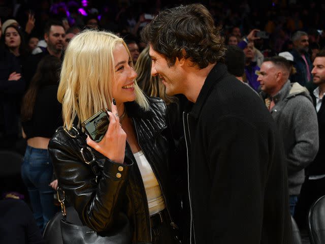 Allen Berezovsky/Getty Ashley Benson and Brandon Davis were first romantically linked in January 2023, when they were spotted getting cozy courtside at a Los Angeles Lakers game.