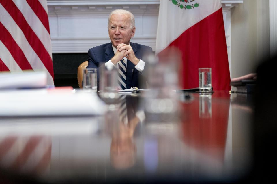 President Joe Biden speaks during a virtual meeting with Mexican President Andres Manuel Lopez Obrador, in the Roosevelt Room of the White House, Monday, March 1, 2021, in Washington. (AP Photo/Andrew Harnik)