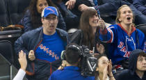 <p>John Oliver goes all out for the New York Rangers at Madison Square Garden.<br> (TM/NHL/Getty Images) </p>