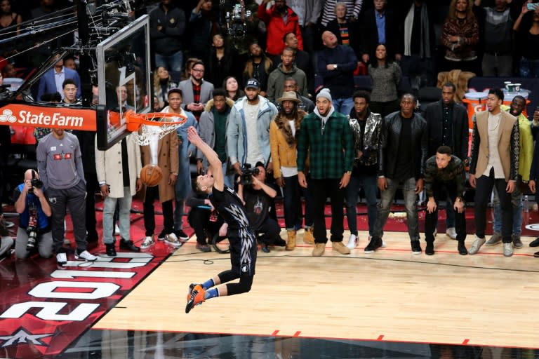 Zach LaVine of the Minnesota Timberwolves dunks watched by other NBA players, during NBA All-Star Weekend at Air Canada Centre in Toronto, on February 13, 2016