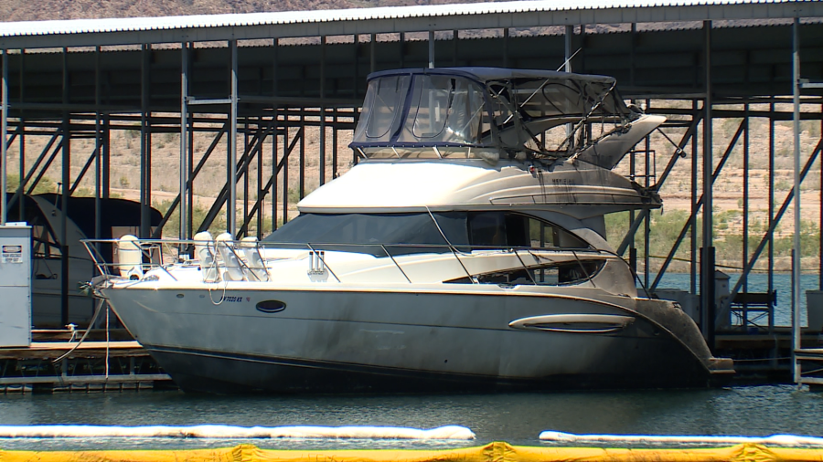 One of the burned boats that did not sink during Sunday morning’s fire at the Las Vegas Boat Harbor Marina. (KLAS)