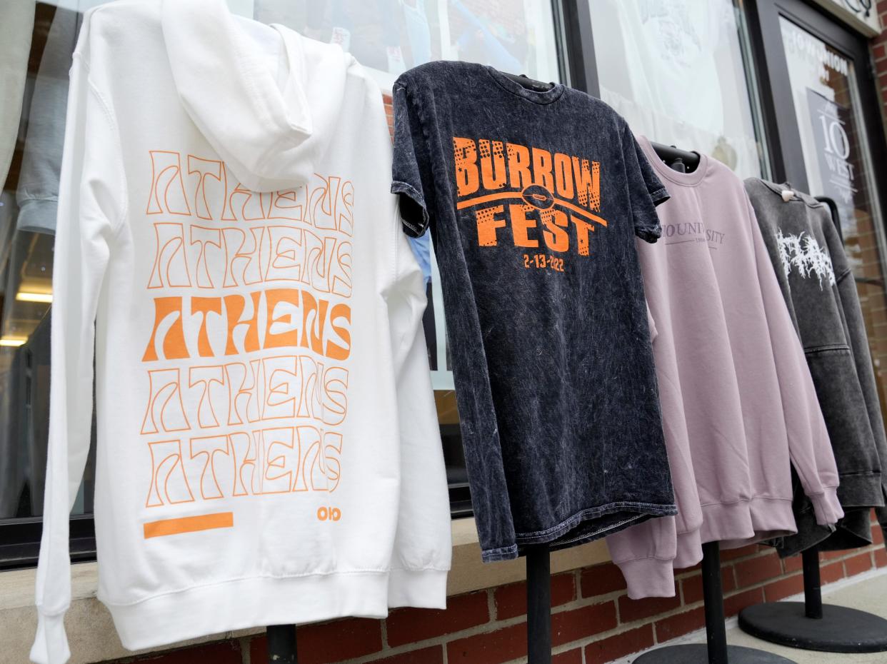 A T-shirt at 10 West Clothing Co. in uptown Athens refers to Cincinnati Bengals quarterback Joe Burrow. The college town is rallying around its native son, who will be playing in this weekend's AFC championship game.