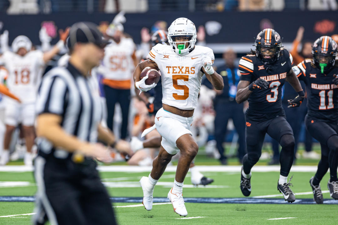 ARLINGTON, TX - DECEMBER 02: Texas Longhorns wide receiver Adonai Mitchell (#5) runs up field after a catch during the Big 12 Championship football game between the Texas Longhorns and Oklahoma State Cowboys on December 02, 2023 at AT&T Studium in Arlington, Texas. (Photo by Matthew Visinsky/Icon Sportswire via Getty Images)