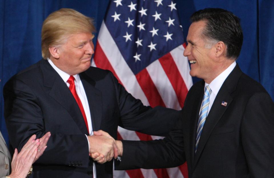 Donald Trump greets Mitt Romney after endorsing his candidacy for president at the Trump Hotel in Las Vegas, Nevada February 2, 2012. (Photo: Steve Marcus/ Reuters)