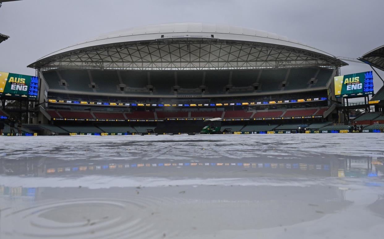 Covers on as rain falls during the third T20 International in the Women's Ashes series between Australia and England at Adelaide Oval on January 23, 2022 in Adelaide, Australi - CA/Cricket Australia via Getty Images