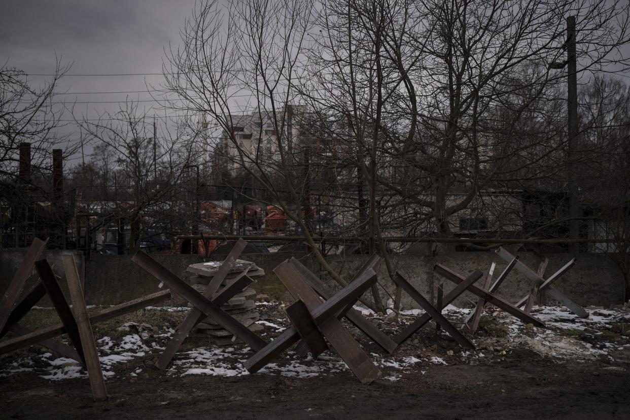Metal road blocks built by volunteers sit outside a welding shop before being taken to new checkpoints across the country, in Lviv, Ukraine, Thursday, March 3, 2022.