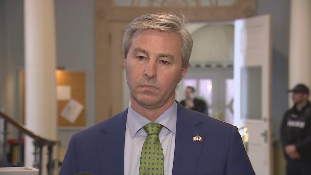 Premier Tim Houston says his government's willingness to change couse of legislation is a sign of its willingness to listen to the public. (CBC - image credit)