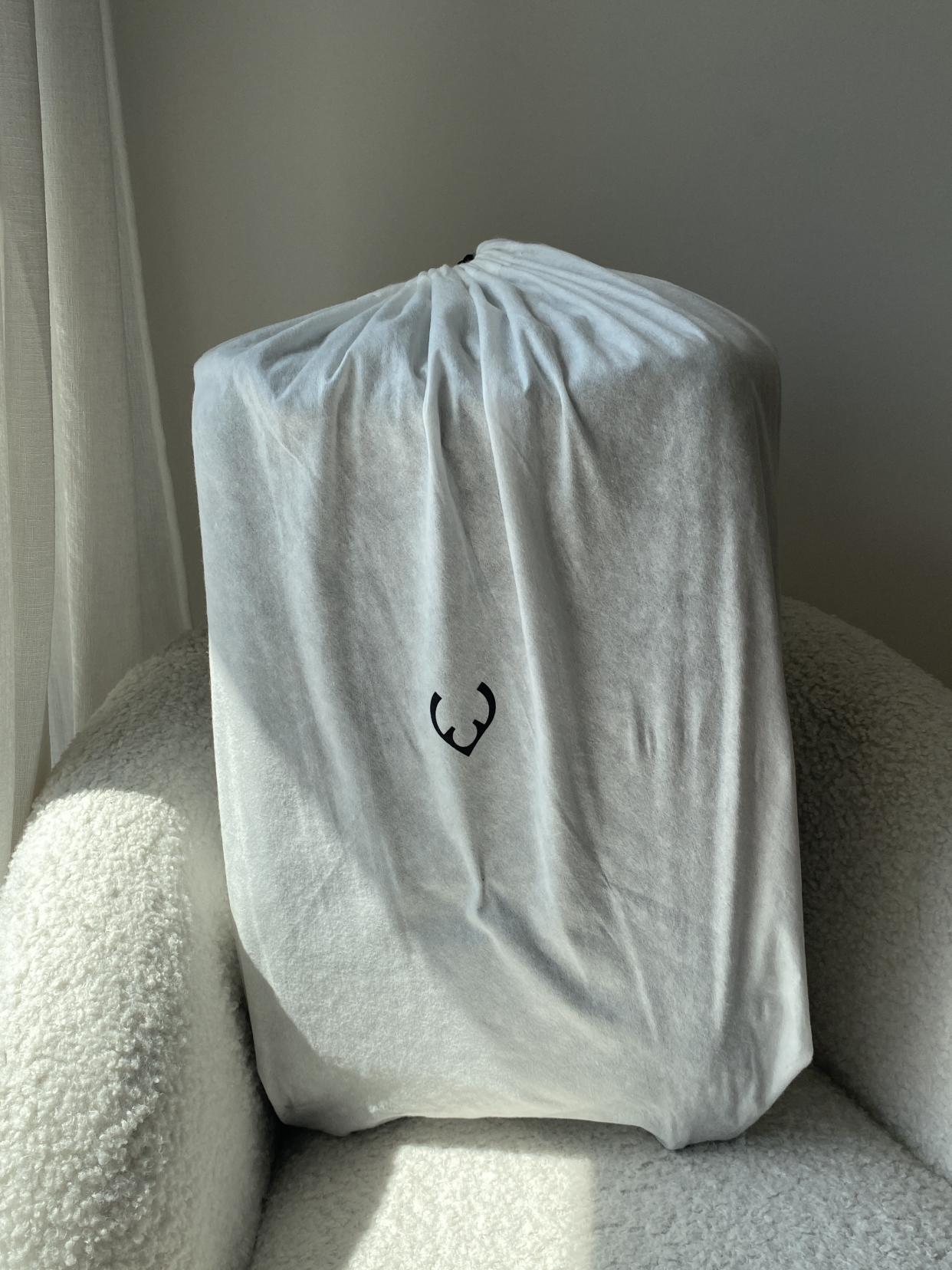 A nod to its luxury design, each Antler suitcase comes in its own dust bag. (Yahoo Life UK