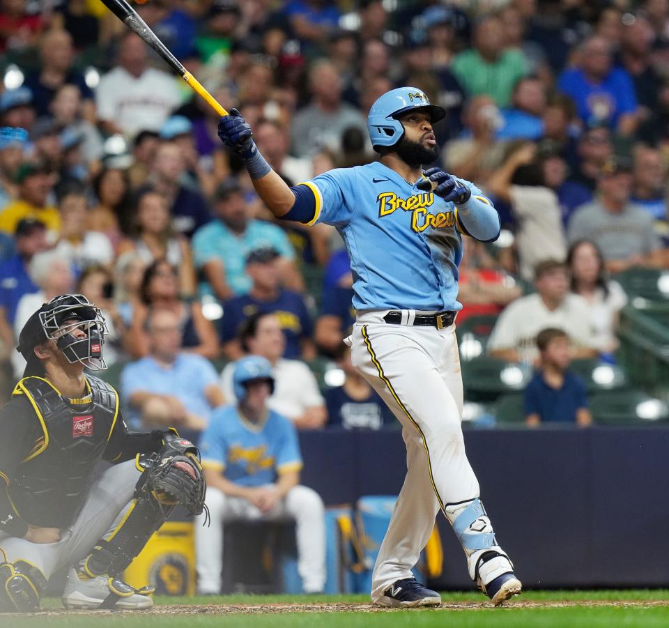Milwaukee Brewers first baseman Carlos Santana (41) homers on a fly ball to right center field during the fifth inning of the game against the Pittsburgh Pirates on Friday August 4, 2023 at American Family Field in Milwaukee, Wis.