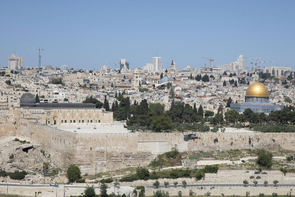 The Dome of the Rock and al-Aqsa mosque compound, which remains shut to prevent the spread of coronavirus during the holy month of Ramadan, is seen from an overlook Friday, May 1, 2020. (AP Photo/Ariel Schalit)