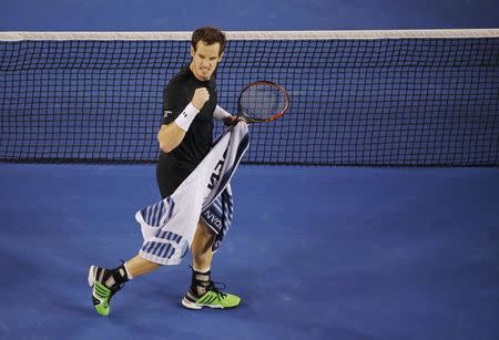 Andy Murray of Britain reacts after winning the second set against Novak Djokovic of Serbia during their men's singles final match at the Australian Open 2015 tennis tournament in Melbourne February 1, 2015. REUTERS/Carlos Barria