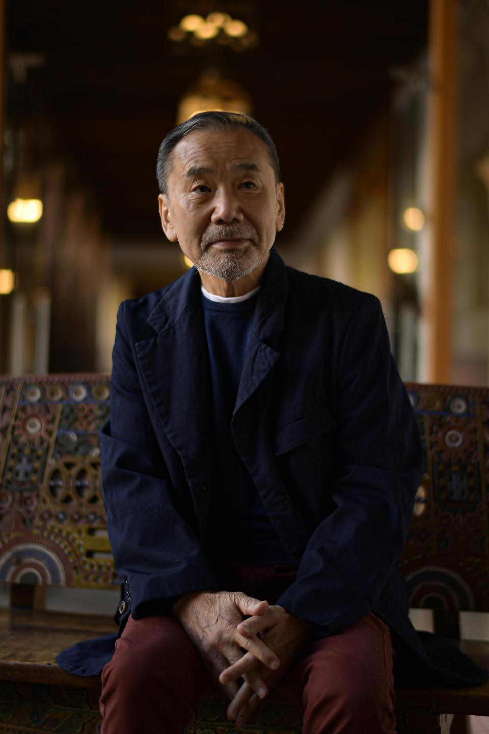 Japanese author Haruki Murakami poses ahead of an interview with The Associated Press in Oviedo, northern Spain, Wednesday, Oct. 18, 2023. Murakami said during the interview that he is torn by the conflict in Israel since he has Jewish friends but understands that the situation of the Palestinians is dire and that we must pray for peace in Gaza. But he also feels confident that fiction can help us cope with increasingly perilous times by helping readers learn the wisdom found in refraining from making quick judgments. Murakami will receive Spain's Princess of Asturias prize for literature later Friday Oct. 20, 2023. (AP Photo/Alvaro Barrientos)