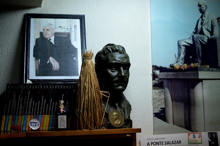 A portrait and a bust of Portugal's former dictator Antonio Oliveira Salazar, seen at a restaurant in Santa Comba Dao, central Portugal, on March 27, 2014