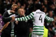 Celtic manager Neil Lennon celebrates at the final whistle during their UEFA Champions League Group G match against Barcelona, at Celtic Park in Glasgow. Celtic sent shockwaves around Europe as they produced a stunning 2-1 win to end the Catalan giants' 100 per cent record in this season's competition