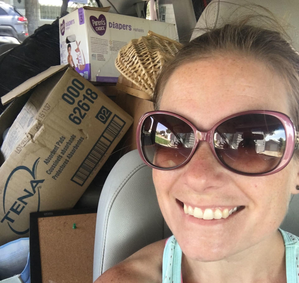 Stacey Cole seen with diapers in the backseat of her car. Ms Cole is a dumpster diver and saves hundreds on her grocery bill each month.